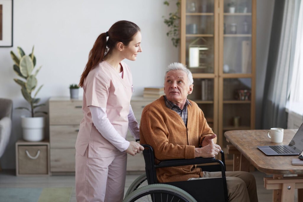 elderly man at desk